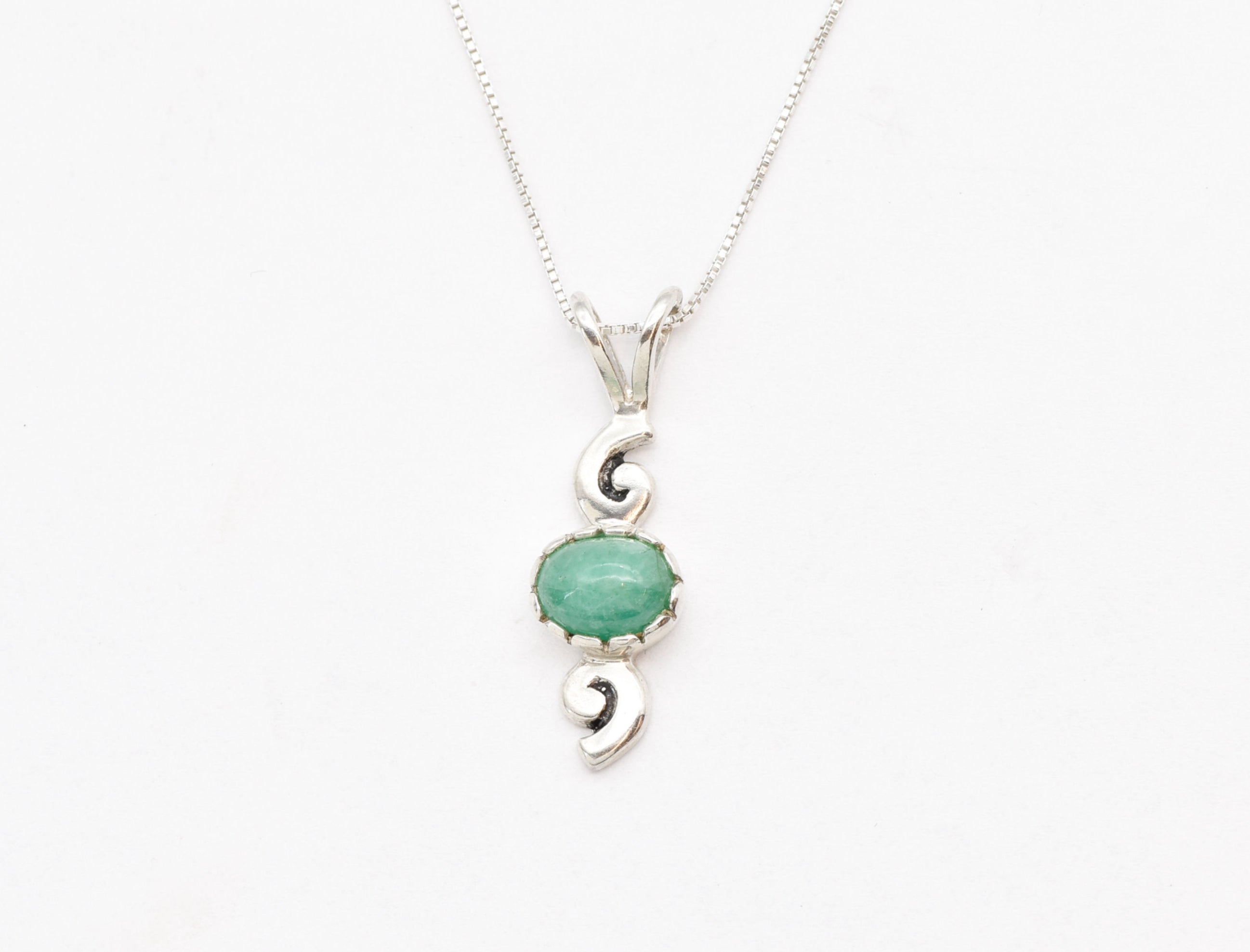 Elegant Sterling Silver Natural Emerald Pendant, perfect May Birthstone gift symbolizing harmony and emotional healing.