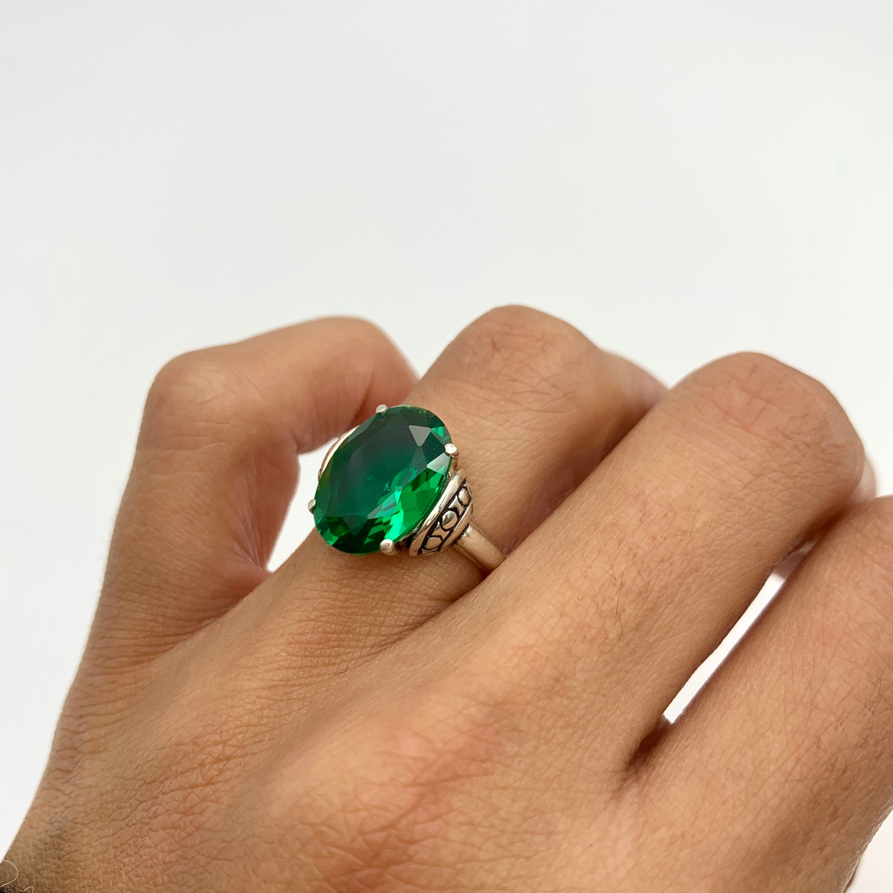 Elegant 925 Sterling Silver ring featuring a stunning oval Created Green Emerald, ideal May birthstone gift for special occasions.