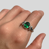 Elegant 925 Sterling Silver ring featuring a stunning oval Created Green Emerald, perfect for May birthdays and special occasions.
