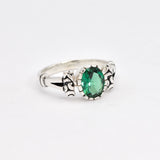Delicate 925 Sterling Silver ring showcasing a lovely oval Created Green Emerald, perfect for everyday elegance and May birthdays.