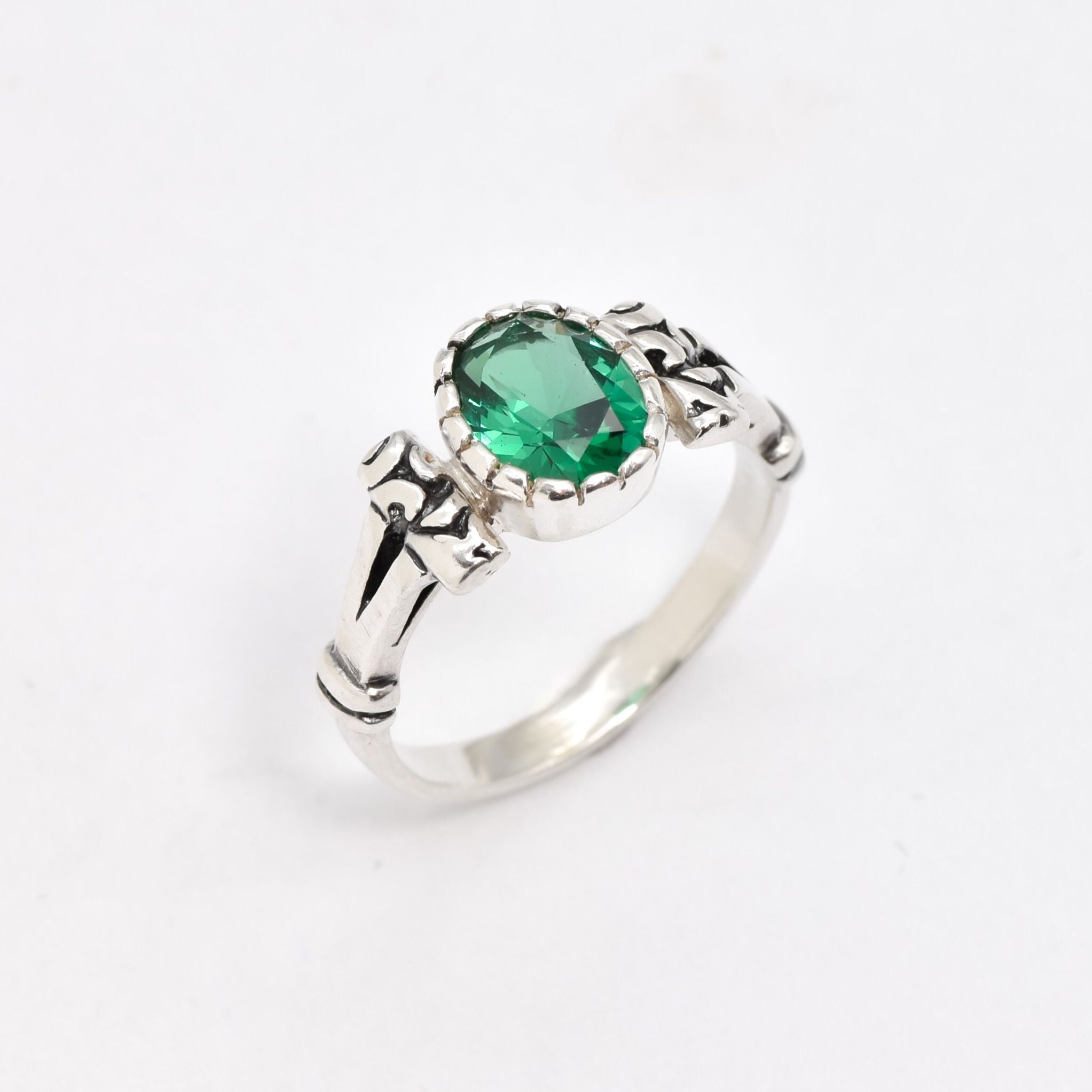 Chic 925 Sterling Silver ring adorned with an oval Created Green Emerald, a thoughtful gift for birthdays and special moments.
