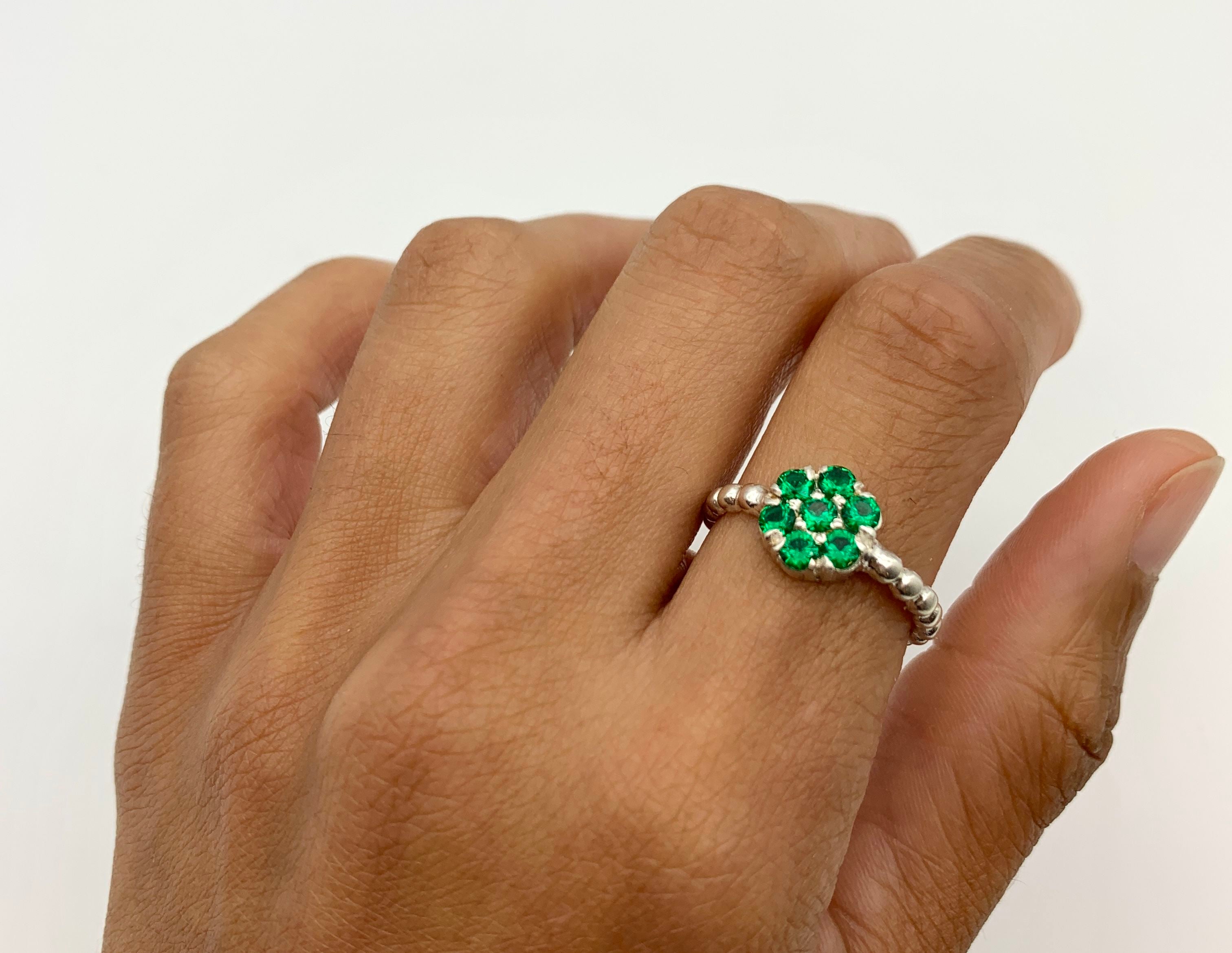 Sterling Silver Emerald Ring with Cluster Setting, ideal May Birthstone gift for birthdays and special occasions.