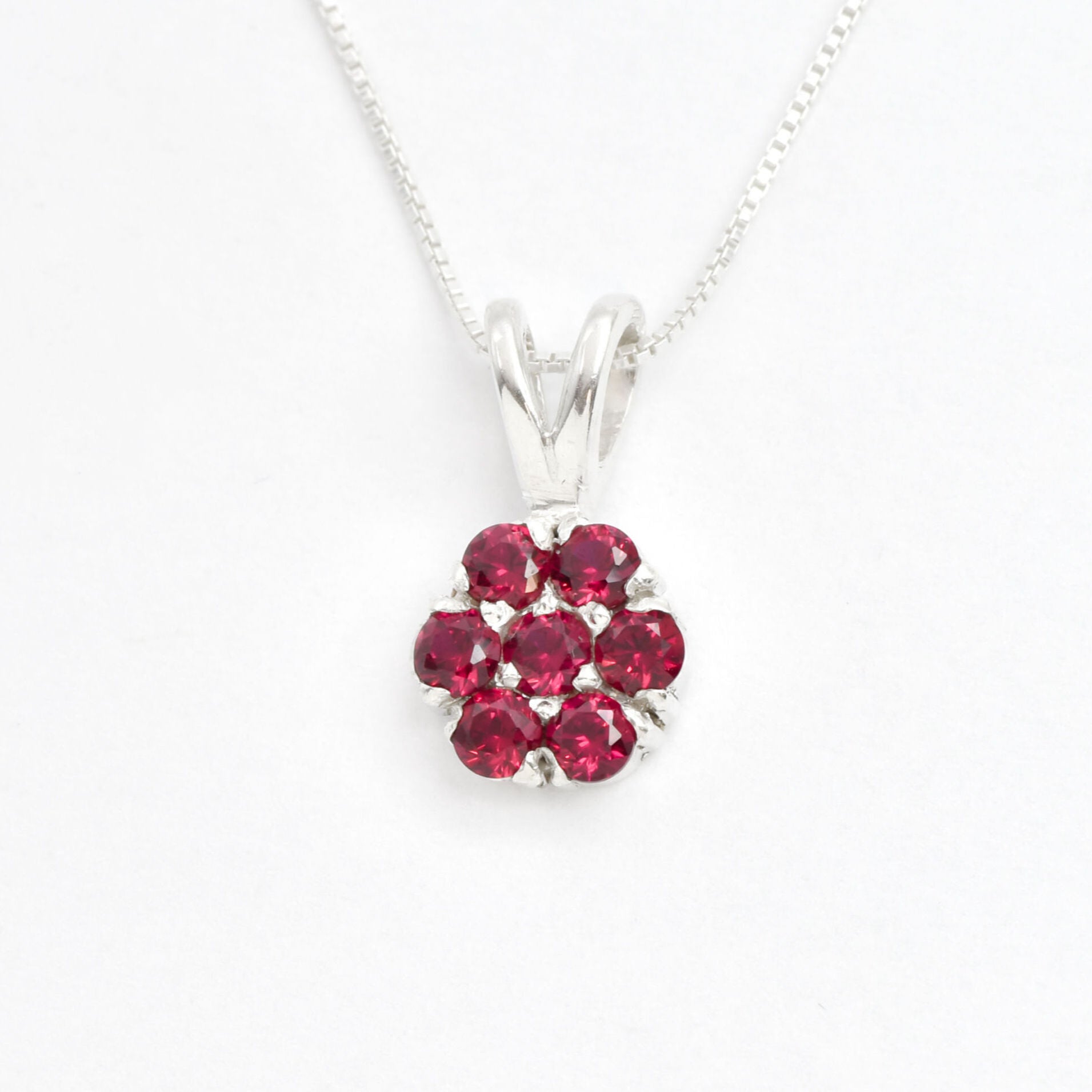 Created Ruby Pendant made in 925 Sterling Silver with Round Created Red Ruby in Cluster setting, July Birthstone gift idea, symbolizes nobility, purity, and passion, ideal for everyday wear and perfect for birthday gifting and special occasions.