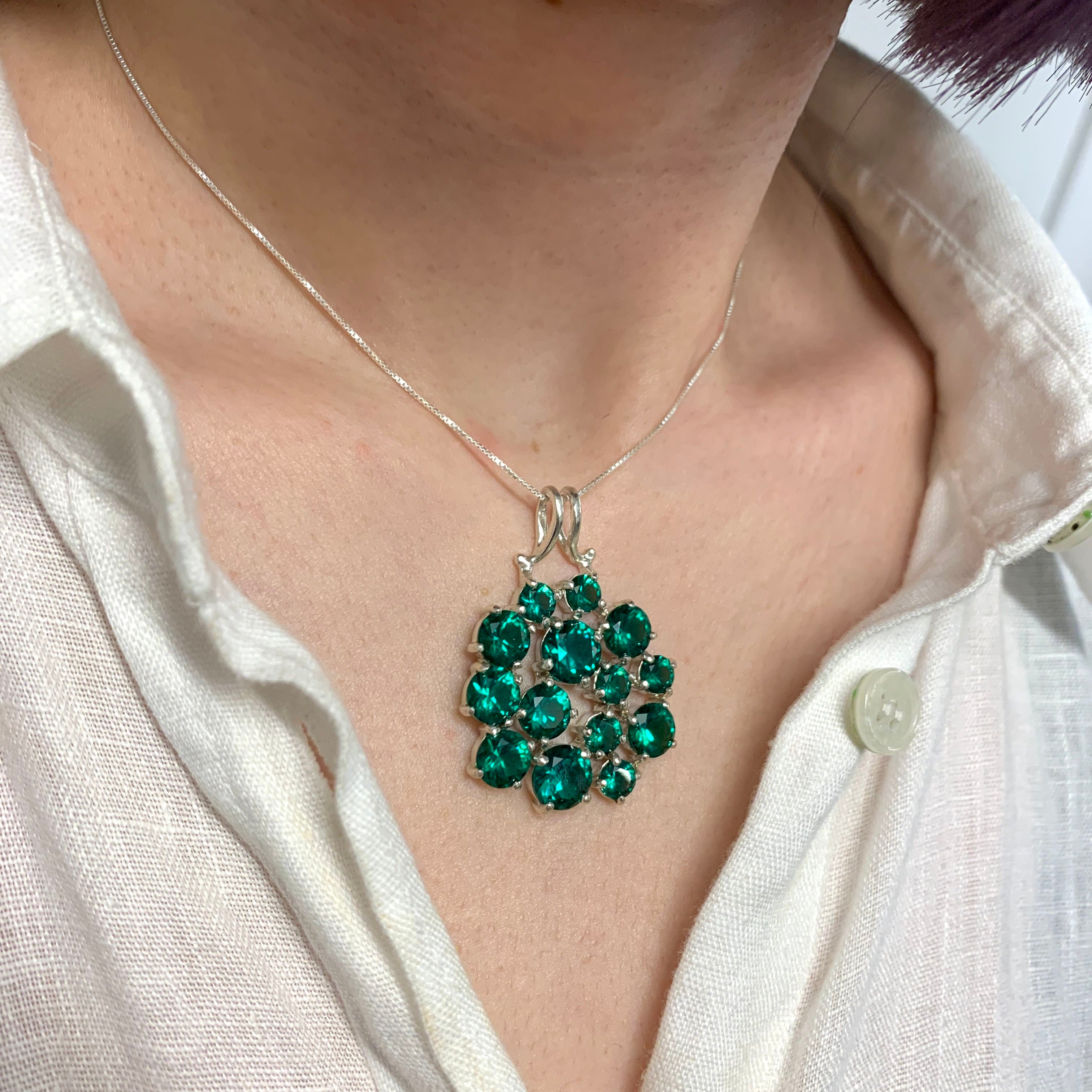 Elegant Created Emerald Pendant in 925 Sterling Silver, featuring a round green emerald, perfect for May birthdays and special occasions.