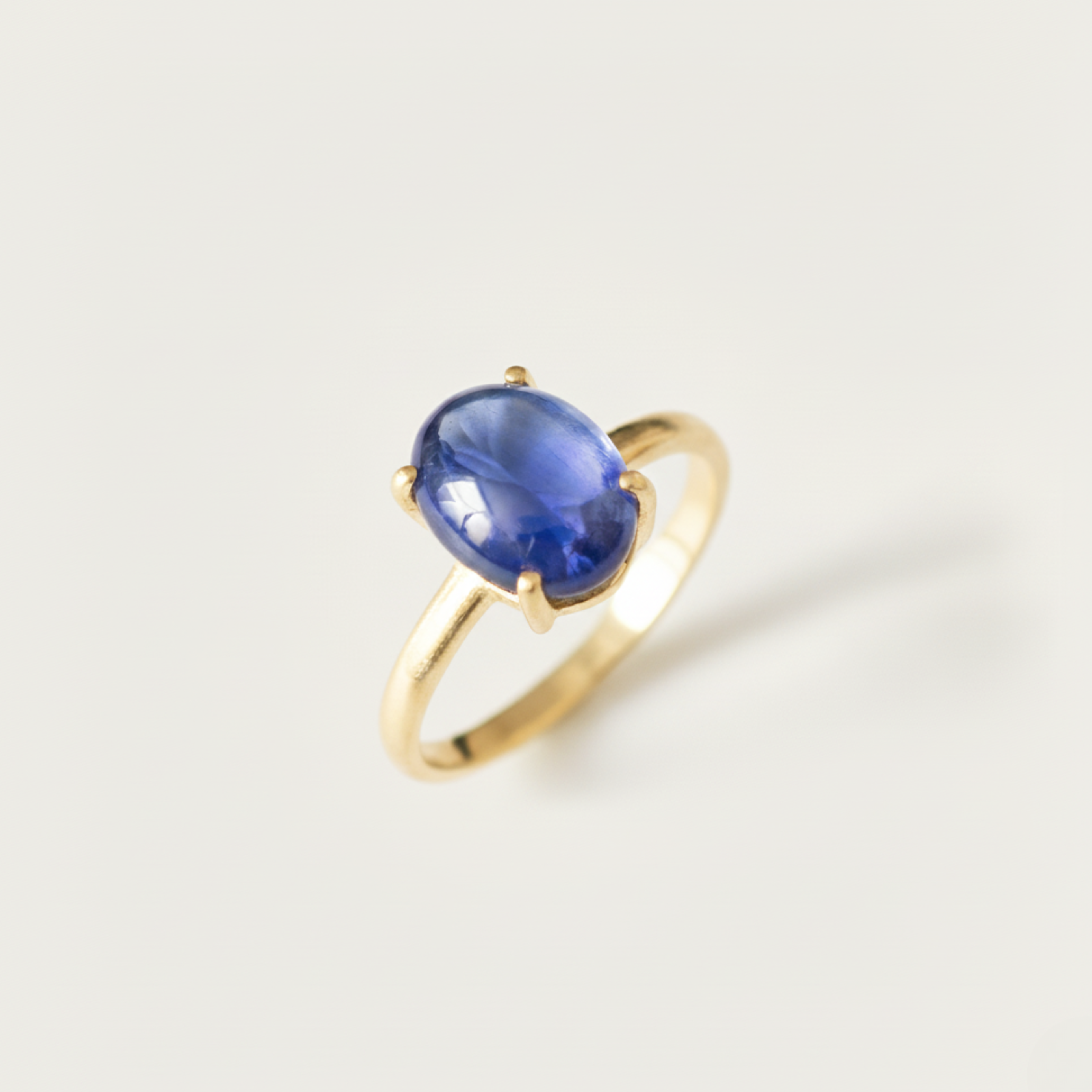 Beautiful 18k Gold Vermeil Ring adorned with a dazzling purple oval Tanzanite, perfect for enhancing your daily elegance and style.
