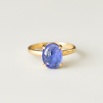 Exquisite purple oval Tanzanite set in 18k Gold Vermeil, a timeless accessory for both daily wear and special celebrations.