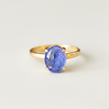 Exquisite purple oval Tanzanite set in 18k Gold Vermeil, a timeless accessory for both daily wear and special celebrations.