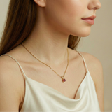 Elegant created ruby pendant in 18k gold vermeil, showcasing a red ruby, perfect for July birthdays and meaningful gifts.