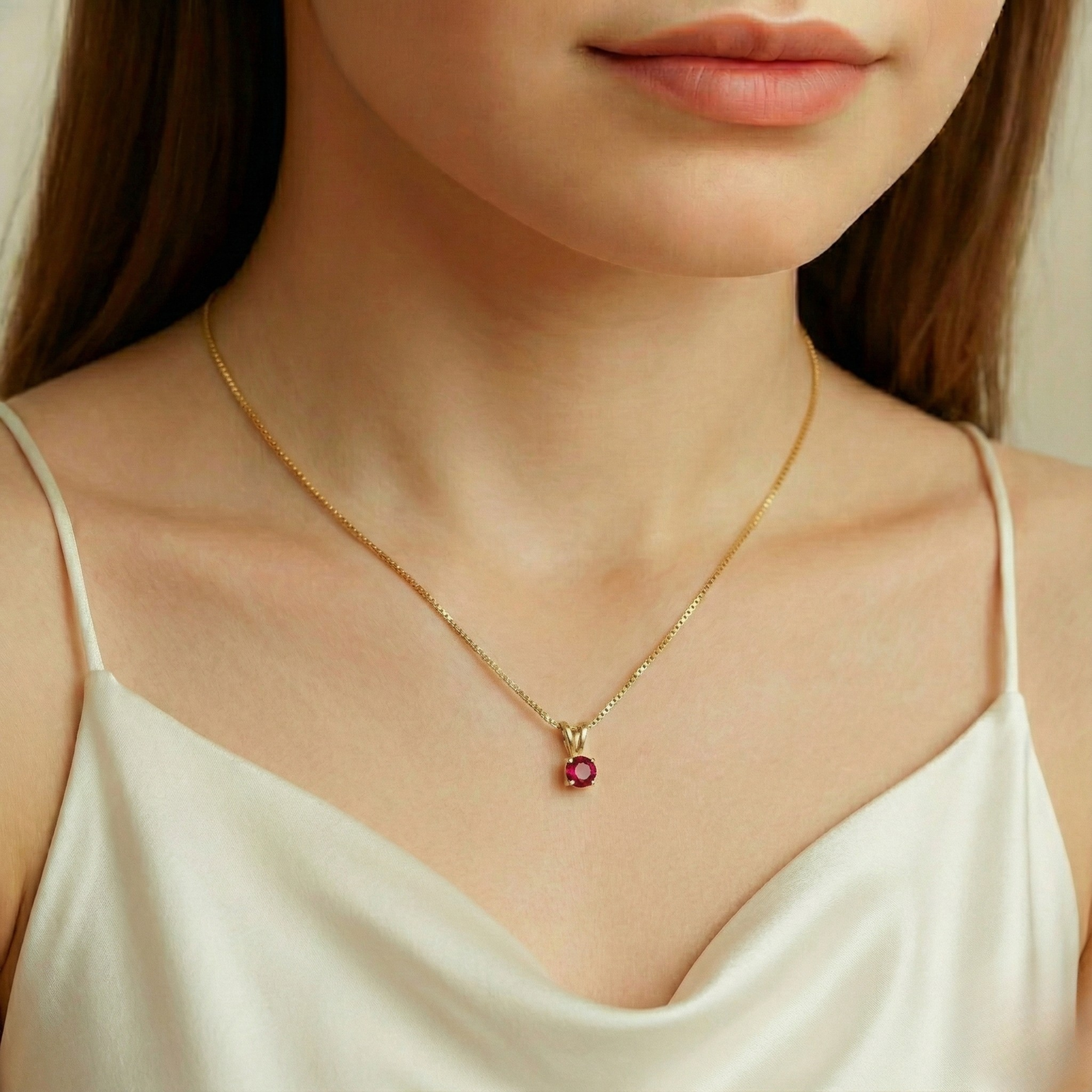 Created Ruby Pendant in 18k Gold Vermeil, featuring a round red ruby, perfect for birthdays and everyday elegance.