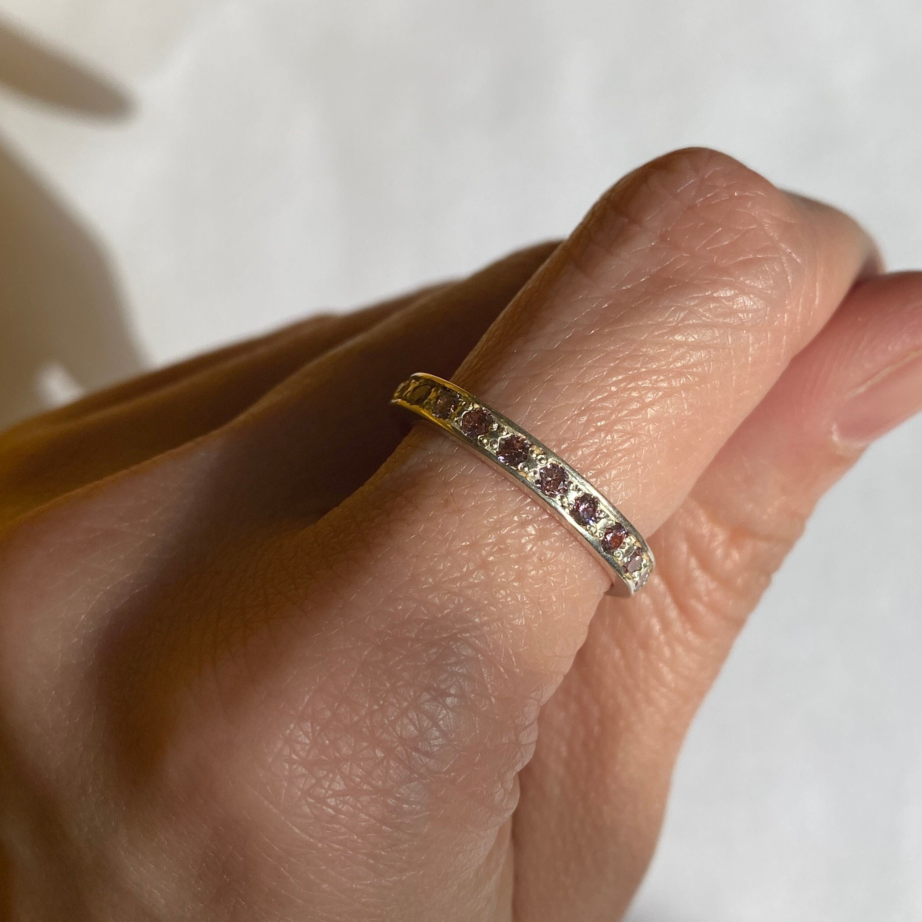 Closer shot of Morganite Ring worn on index finger