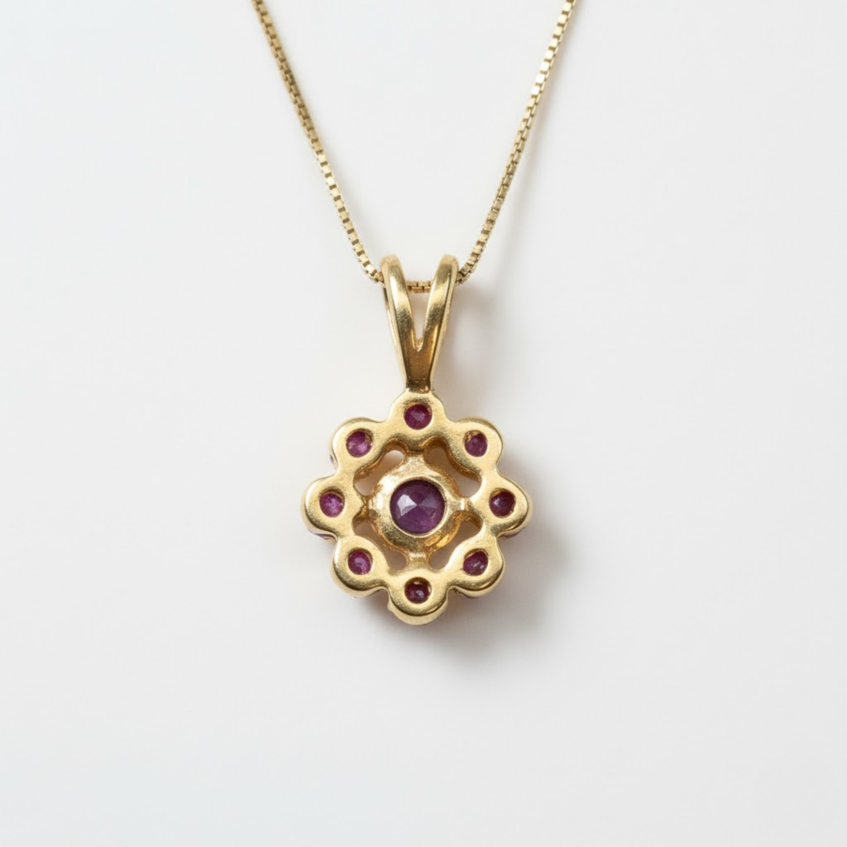 Delicate 18k Gold Vermeil pendant showcasing a radiant red ruby cluster, embodying love and passion, perfect for daily elegance.