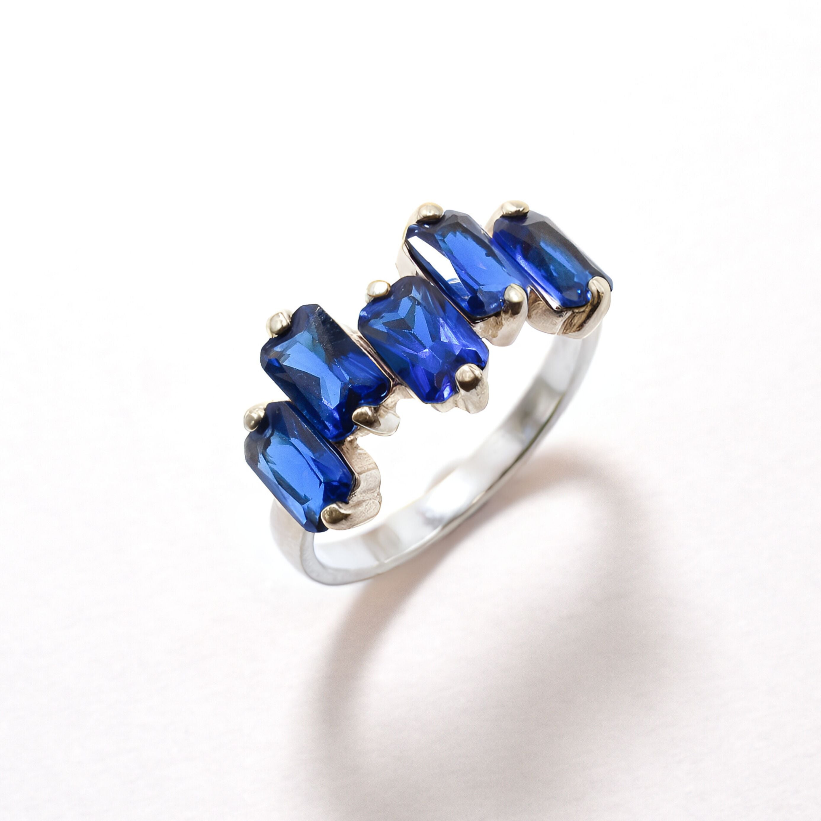 Created Sapphire Ring made in 925 Sterling Silver with Baguette Created Blue Sapphire in Cluster setting, September Birthstone gift idea, symbolizes sincerity, truth, and faithfulness, ideal for everyday wear and perfect for birthday gifting and special occasions.