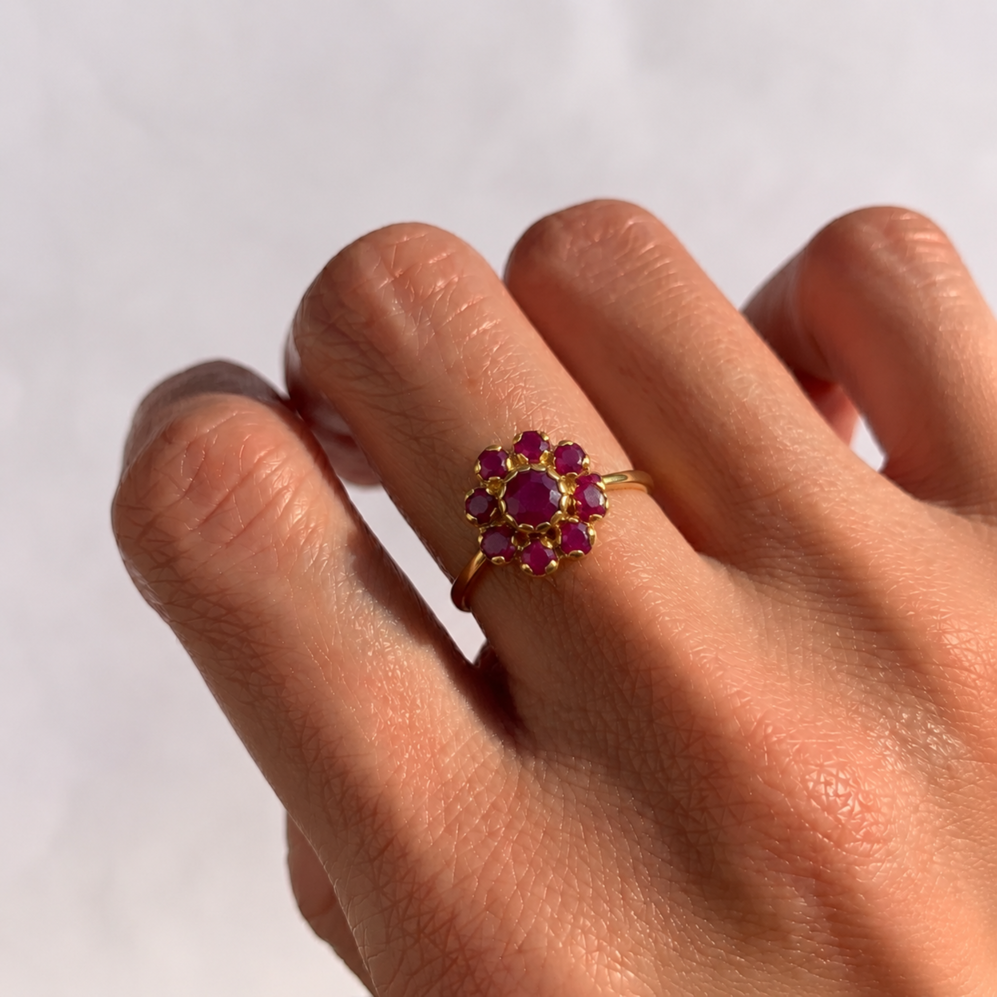 Elegant 18k Gold Vermeil ring featuring a stunning Round Natural Red Ruby in a cluster setting, perfect for special occasions.