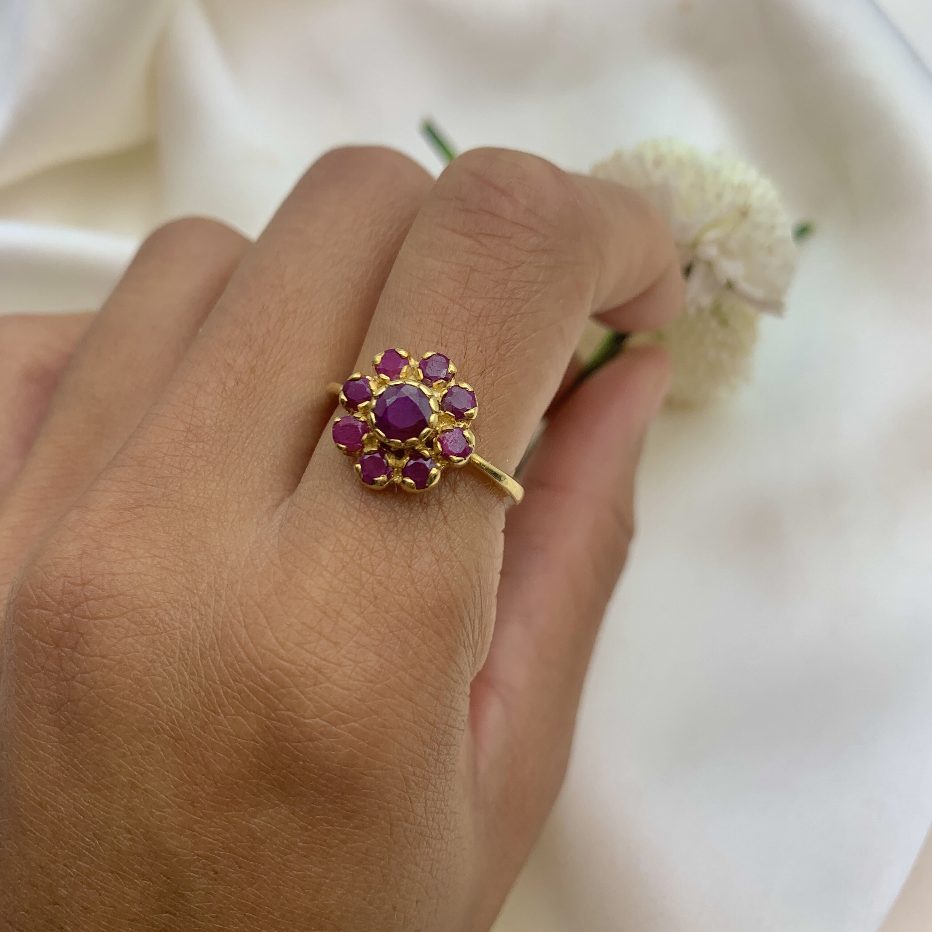 Elegant 18k Gold Vermeil ring featuring a stunning Round Natural Red Ruby in a cluster setting, perfect for special occasions.