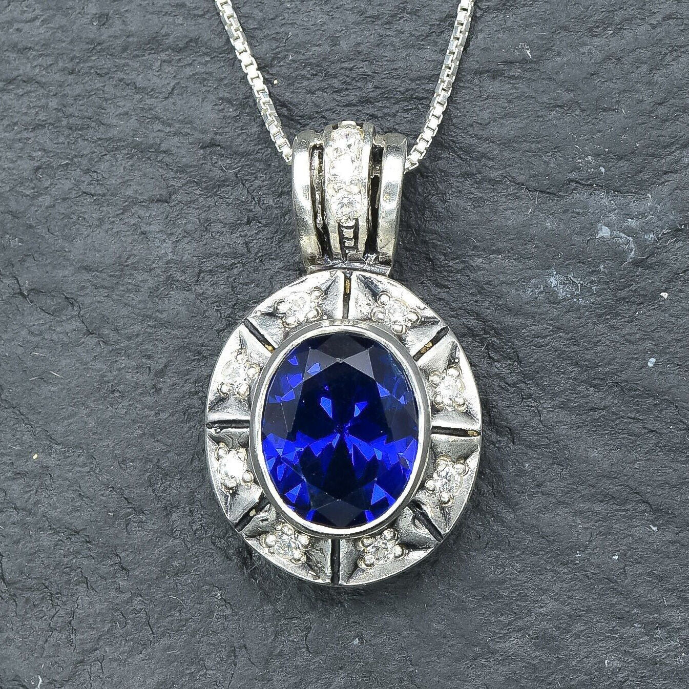 Sterling Silver Sapphire Pendant with Oval Blue Sapphire, perfect for September birthdays and meaningful gifts.