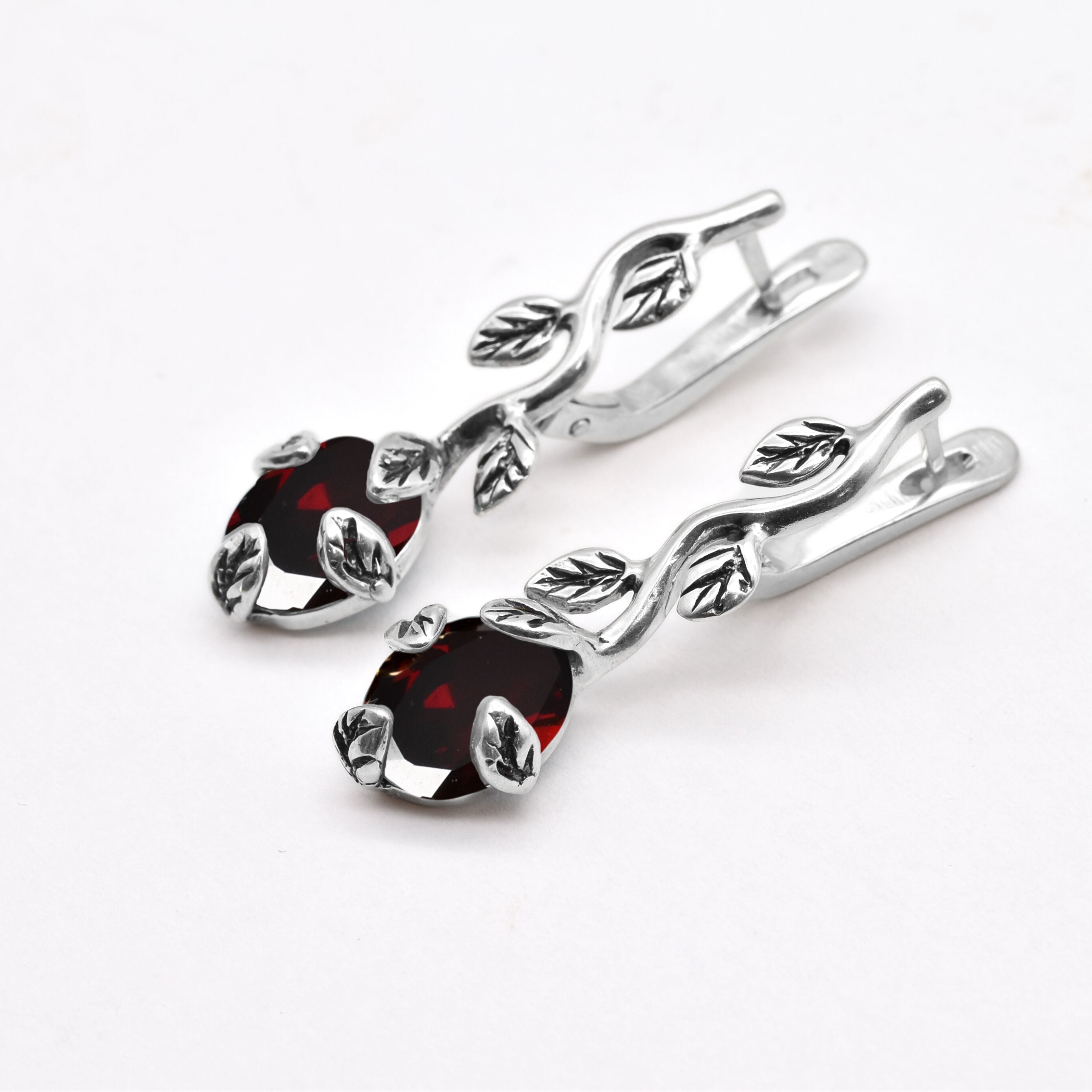 2848-E-nGAR/1: Sterling Silver 925 Garnet 10x8mm Oval