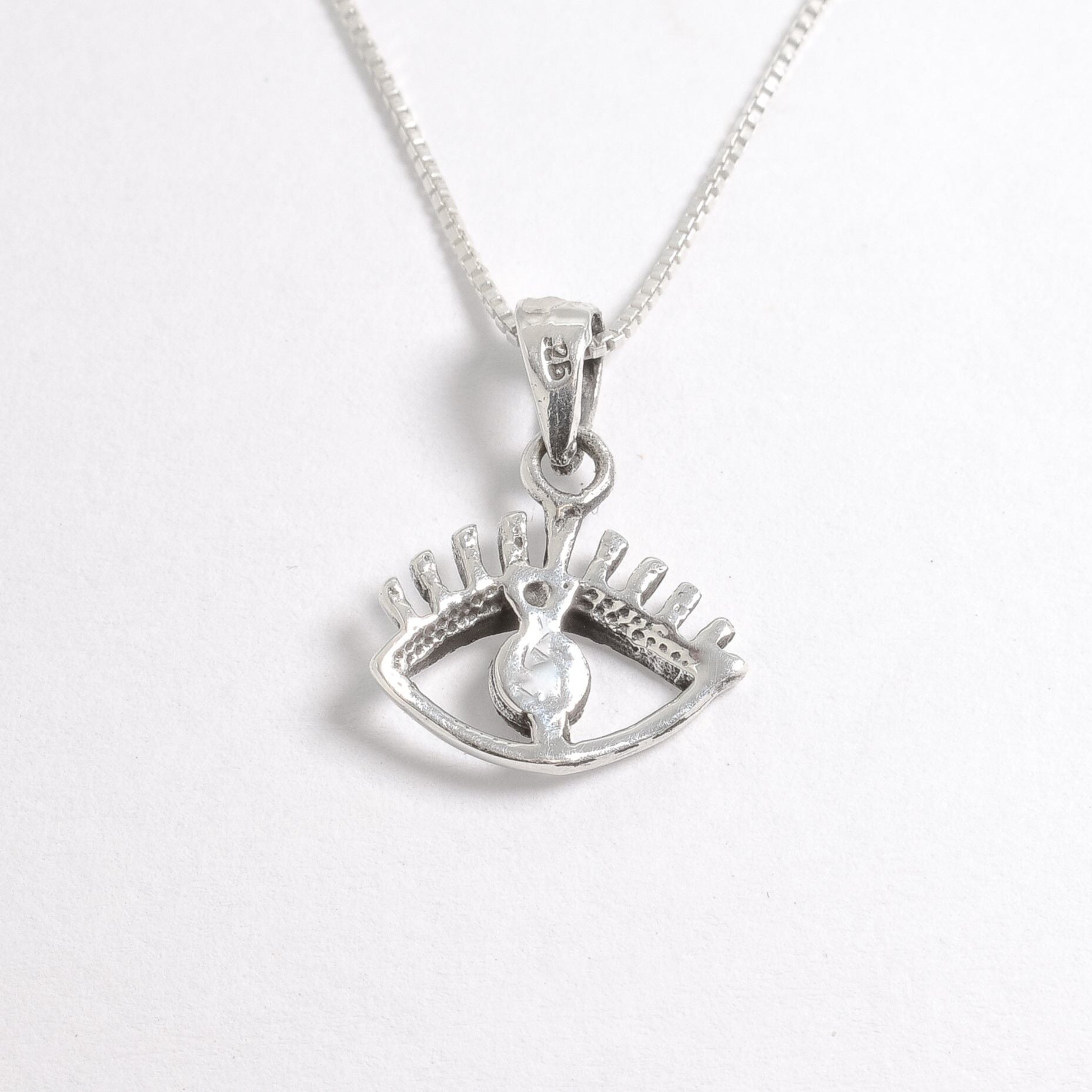 Silver Eye Pendant Back View in White Background