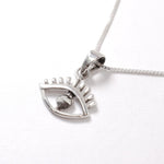 Silver Eye Pendant Angled View in White Background