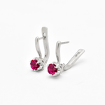 An elegant display of Adina Stone Jewelry featuring intricate designs and shimmering gemstones, perfect for special occasions.