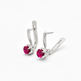 An elegant display of Adina Stone Jewelry featuring intricate designs and shimmering gemstones, perfect for special occasions.