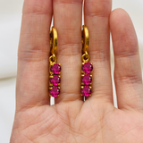 Elegant 18k Gold Vermeil Ruby Earrings featuring a vibrant Round Created Red Ruby, perfect for July birthdays and special events.