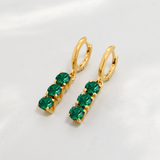 Chic 18k Gold Vermeil Emerald Earrings with a Three-Stone design, a timeless May birthstone piece for all occasions.