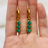 Elegant 18k Gold Vermeil Emerald Earrings with Three-Stone setting, ideal May birthstone gift for special occasions.