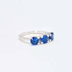 Stunning 925 Sterling Silver ring with a round Created Blue Sapphire, a timeless symbol of sincerity and loyalty.