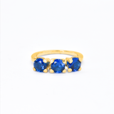 Created Sapphire Ring made in 18k Gold Vermeil with Round Created Blue Sapphire in Three-Stone setting, September Birthstone gift idea, symbolizes sincerity, truth, and faithfulness, ideal for everyday wear and perfect for birthday gifting and special occasions.