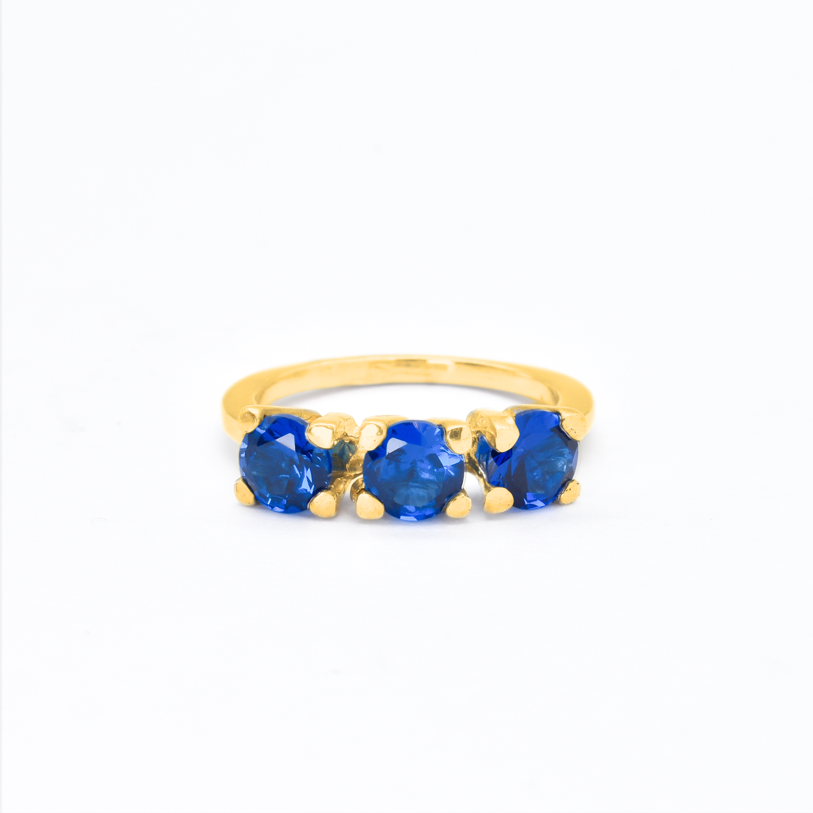 Created Sapphire Ring made in 18k Gold Vermeil with Round Created Blue Sapphire in Three-Stone setting, September Birthstone gift idea, symbolizes sincerity, truth, and faithfulness, ideal for everyday wear and perfect for birthday gifting and special occasions.