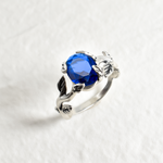 Gorgeous 925 Sterling Silver Ring with an Oval Created Blue Sapphire, a meaningful gift for birthdays and celebrations.