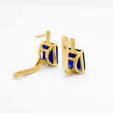 Sophisticated 18k Gold Vermeil earrings adorned with Baguette Created Blue Sapphire, a timeless accessory for any occasion.