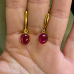 Chic 18k Gold Vermeil Earrings set with a dazzling Oval Natural Ruby, epitomizing elegance for any occasion.