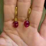Chic 18k Gold Vermeil Earrings set with a dazzling Oval Natural Ruby, epitomizing elegance for any occasion.