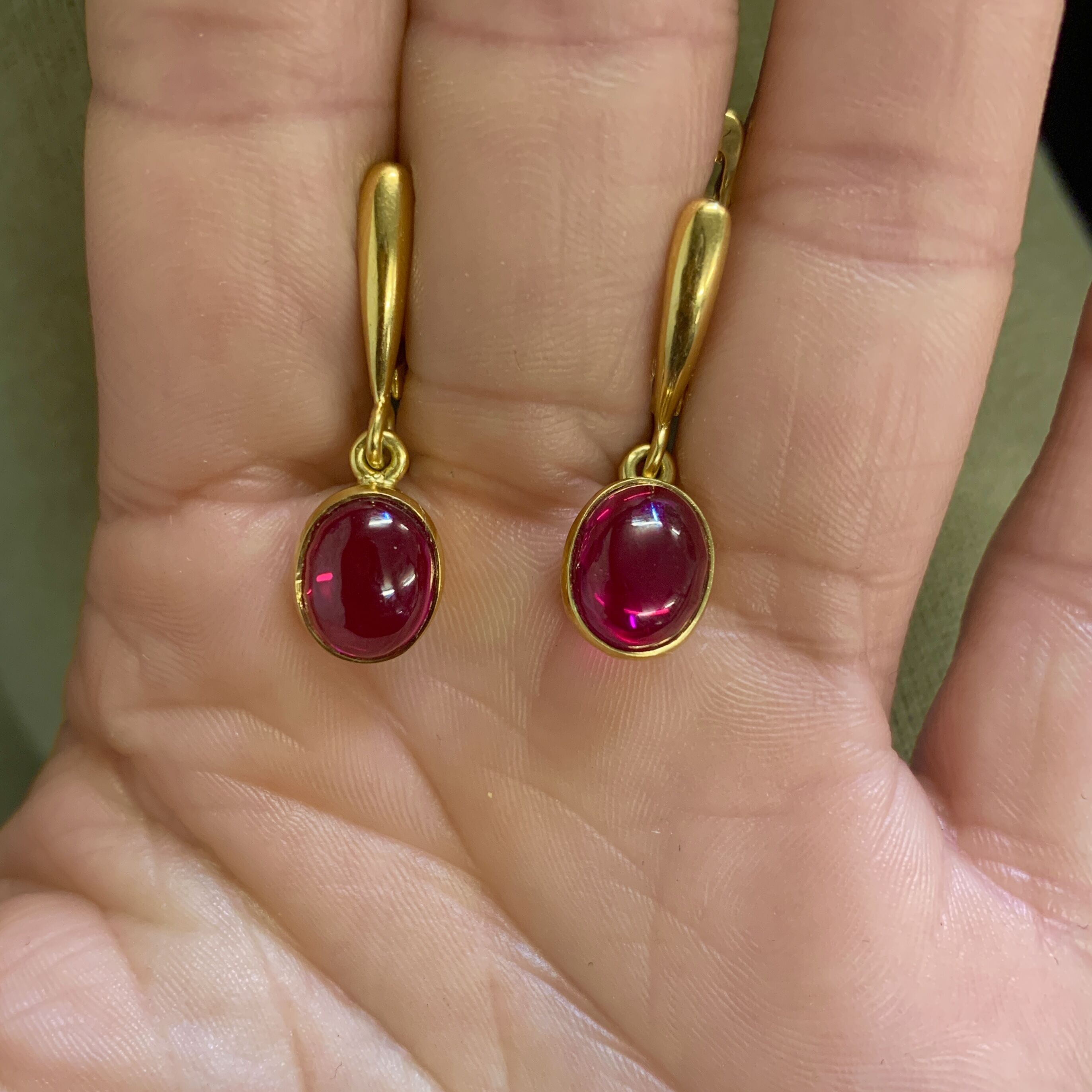 Chic 18k Gold Vermeil Earrings set with a dazzling Oval Natural Ruby, epitomizing elegance for any occasion.
