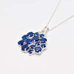 Cluster Sapphire Necklace - Stunning Blue Flower Pendant crafted in Sterling Silver, perfect for everyday elegance and celebrations.
