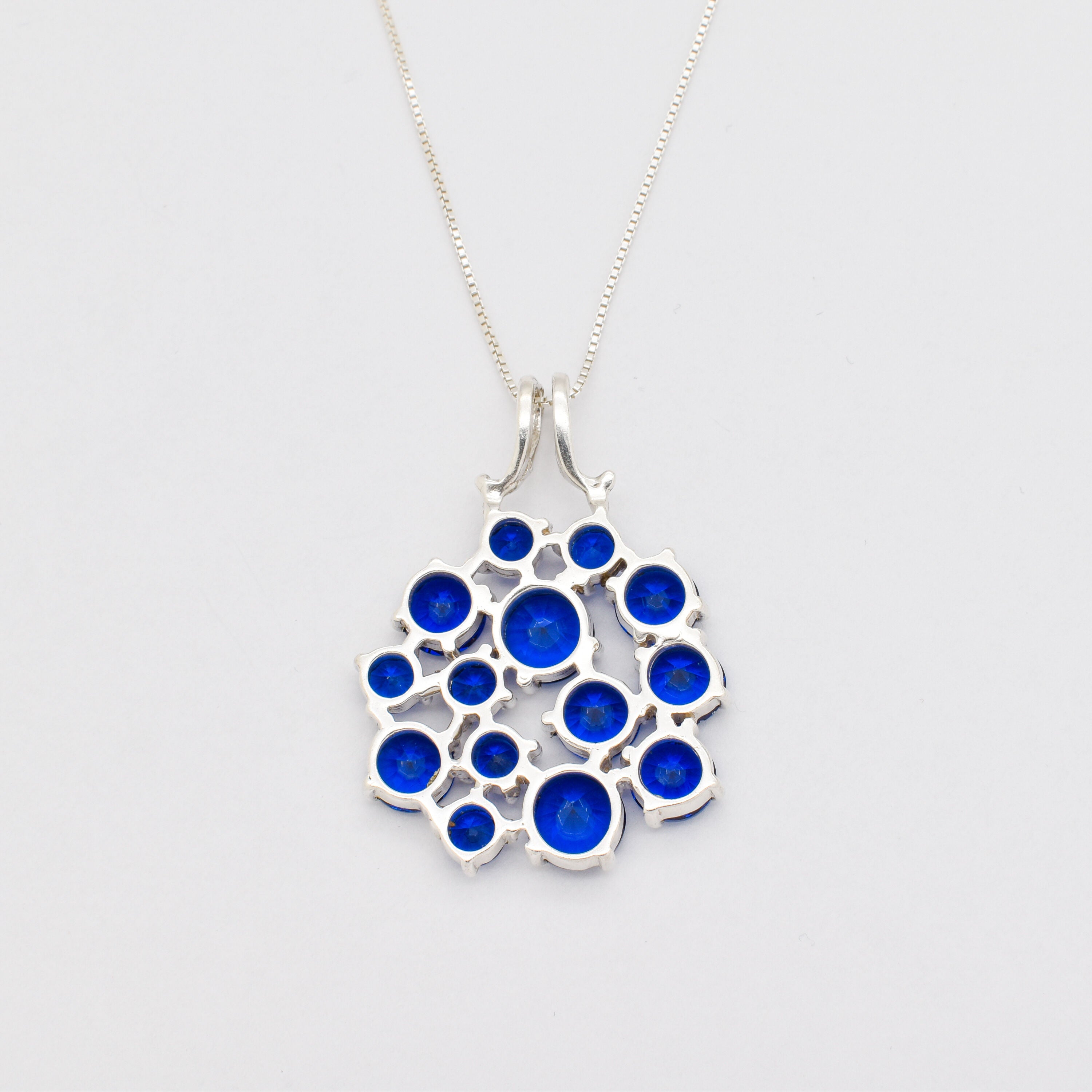 Cluster Sapphire Necklace - Gorgeous Blue Floral Pendant in Sterling Silver, perfect for casual wear and memorable gifting.