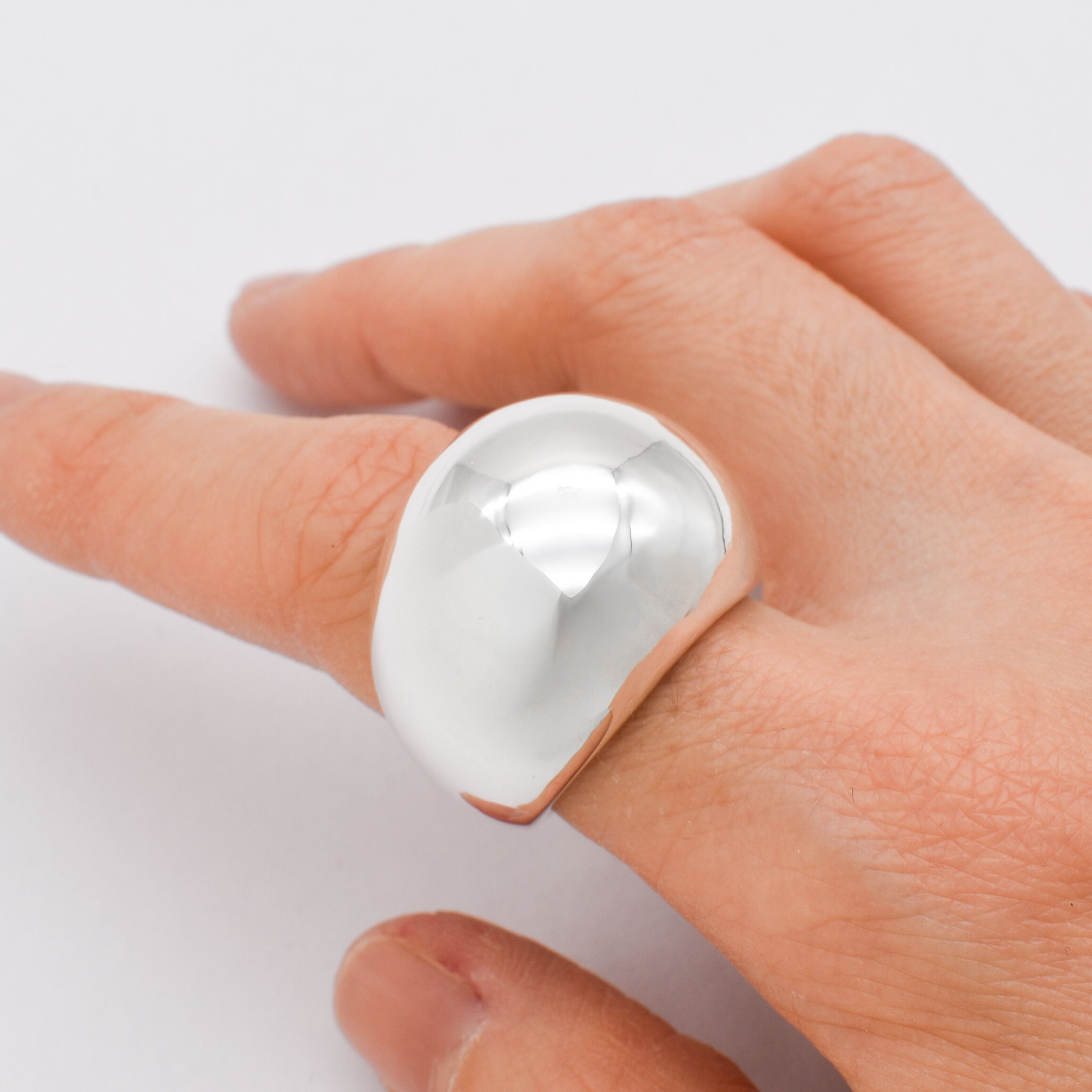 Silver Dome Ring worn on index finger