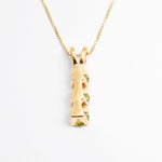 Gold Peridot Necklace Back View in White Background
