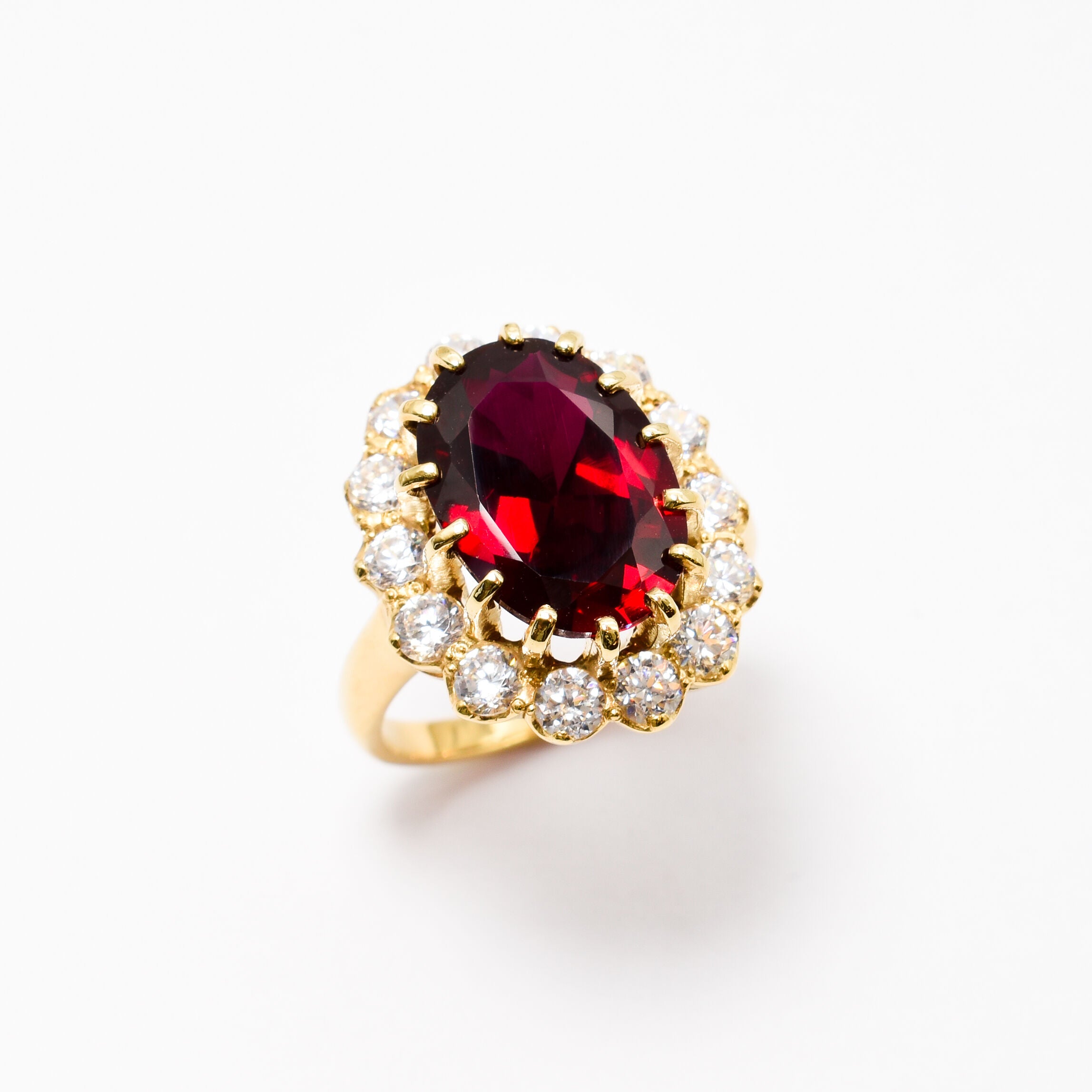 Created Ruby Ring made in 18k Gold Vermeil with Oval Created Red Ruby in Halo setting, July Birthstone gift idea, symbolizes nobility, purity, and passion, ideal for everyday wear and perfect for birthday gifting and special occasions.