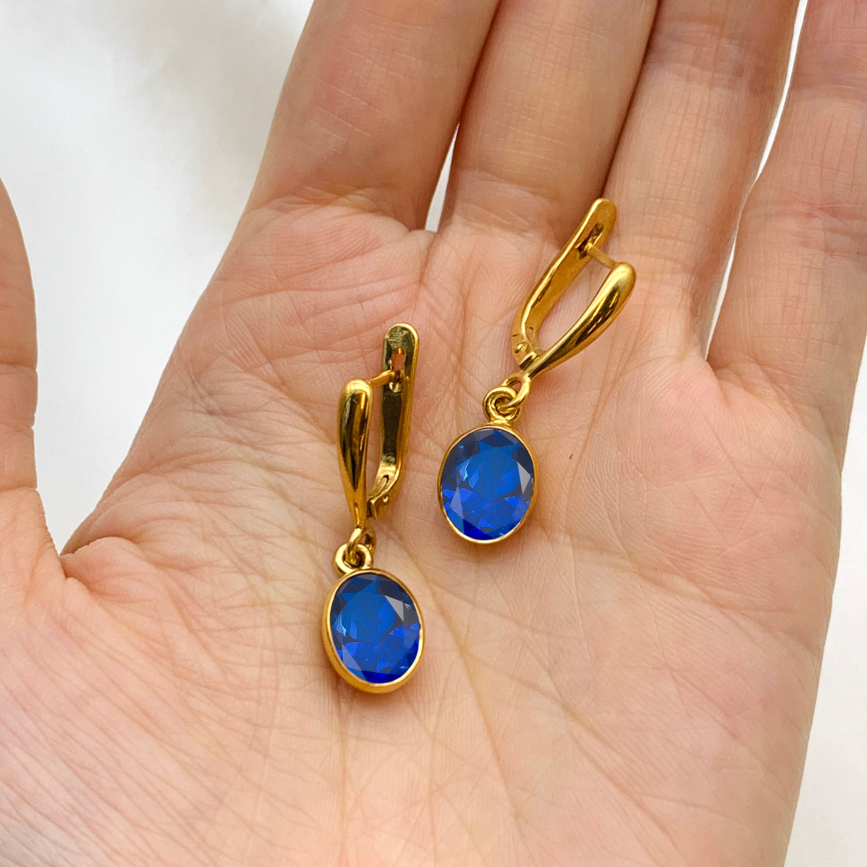 Sapphire Earrings in 18k Gold Vermeil with Oval Blue Sapphire, perfect for September birthdays and special occasions.