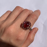 Dazzling 925 Sterling Silver ring with Halo-set Created Red Ruby, a meaningful July birthstone gift for any occasion.