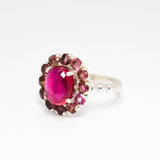 Chic 925 Sterling Silver Ring with a Halo of Created Red Ruby, symbolizes passion, ideal for daily wear and special celebrations.