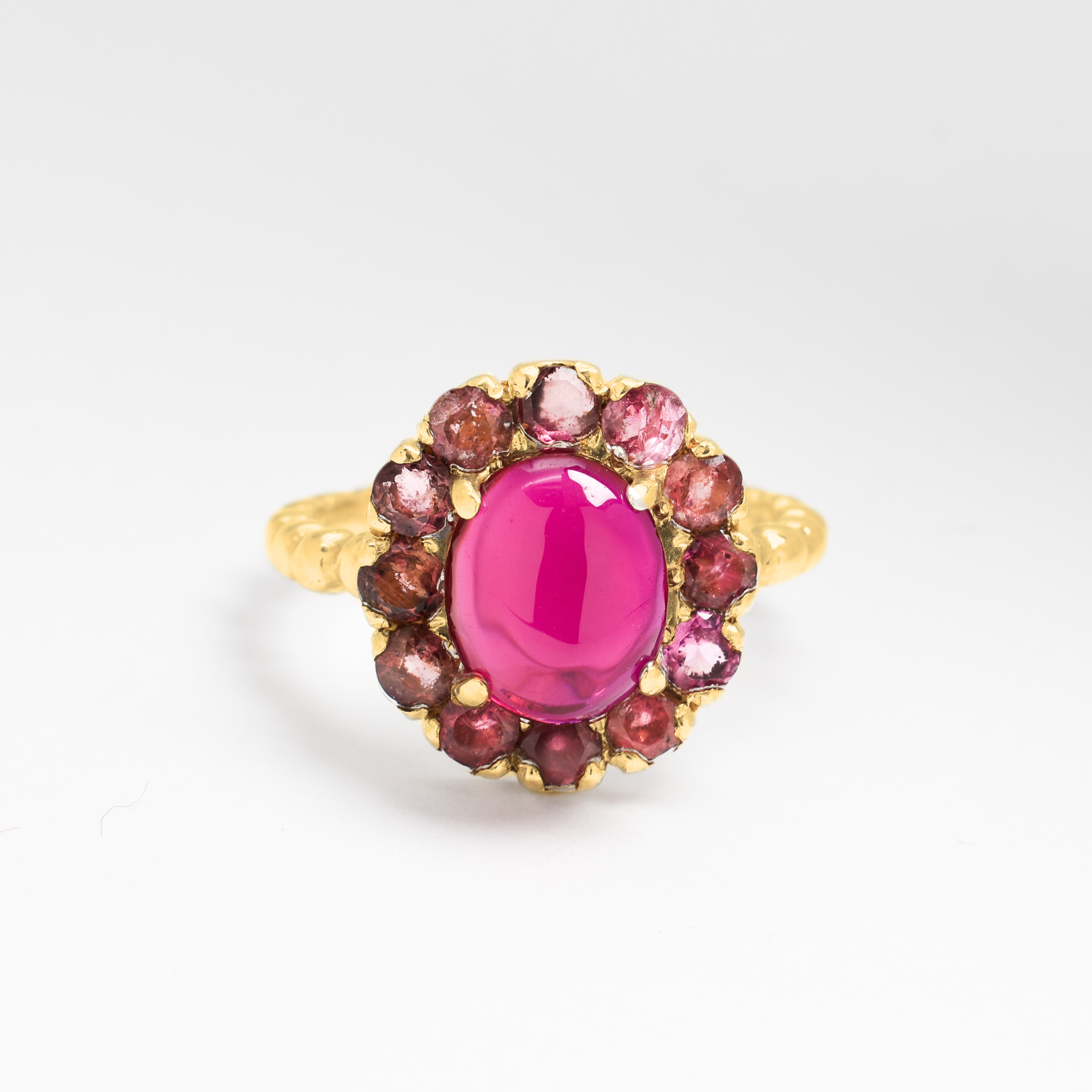 Stunning 18k Gold Vermeil Ring featuring Oval Created Red Ruby in Halo design, a timeless piece for celebrating July birthdays.