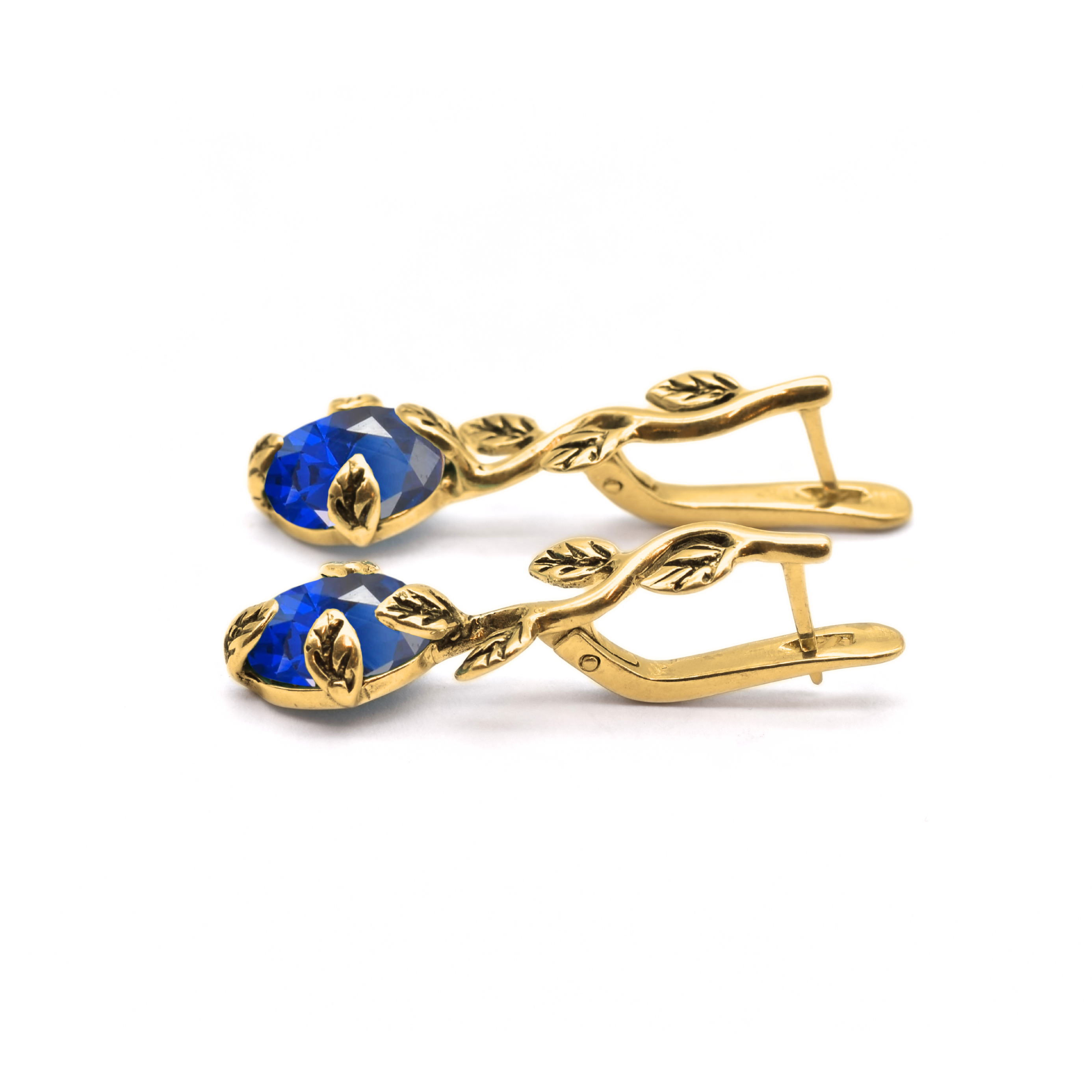 Exquisite 18k Gold Vermeil Earrings with Oval Created Sapphire, a symbol of truth and sincerity, perfect for any occasion.