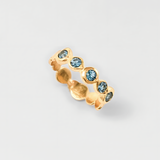 Delicate 18k gold vermeil ring featuring round created aquamarine in bezel, March birthstone ideal for everyday or gifting