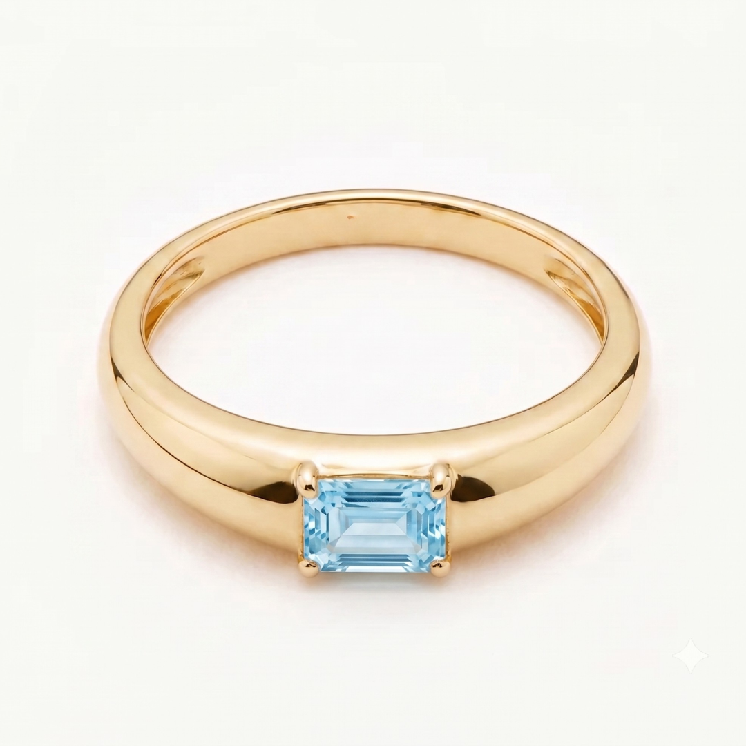 14k yellow gold baguette sky-blue topaz ring, prong-set — December birthstone symbolizing clarity, ideal birthday gift.