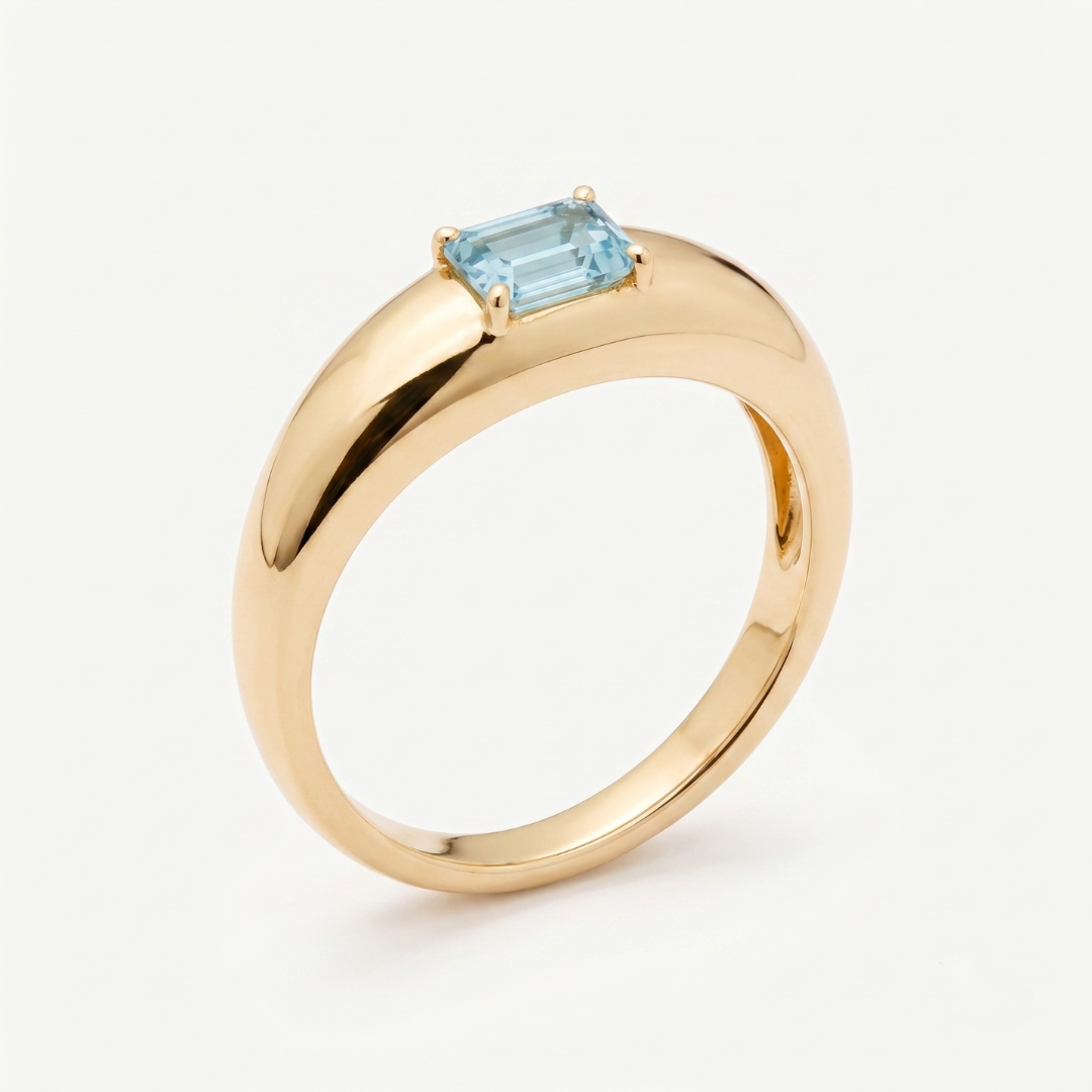 Natural Blue Topaz Solid Gold Ring made in 14k Yellow Gold with Baguette Natural sky Blue Topaz in Prong setting, December Birthstone gift idea, symbolizes clarity, emotional balance, and truth, ideal for everyday wear and perfect for birthday gifting and special occasions.