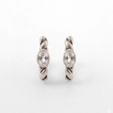 925 sterling silver huggie hoop earrings with clear white topaz, twisted rope texture and bezel-set oval stones, ideal for birthdays, bridal looks and everyday wear; white topaz is associated with clarity and intention.