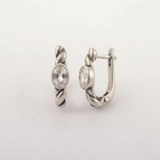 925 sterling silver huggie hoop earrings with clear white topaz, twisted rope texture and bezel-set oval stones, ideal for birthdays, bridal looks and everyday wear; white topaz is associated with clarity and intention.